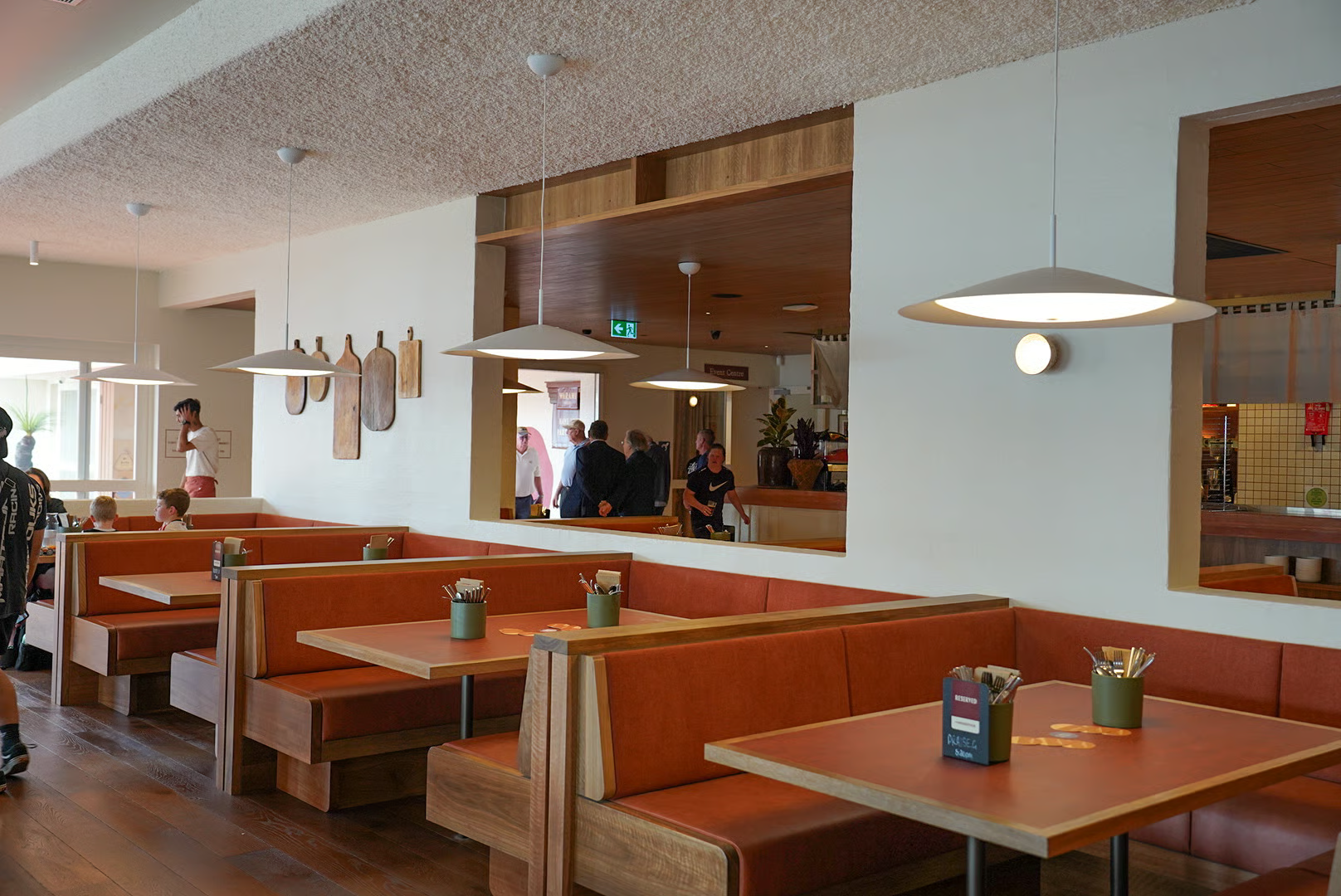 Image of man working on computer with the following text overlayed: Trustworthy, approachable, reliable, precise